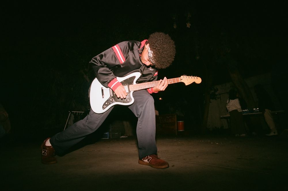 Guitarist mid-performance